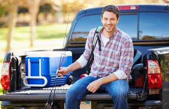 Man enjoying his pickup that he financed with a truck loan